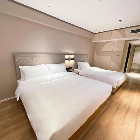 Hanting Hotel Harbin Railway Station Square Esterno foto